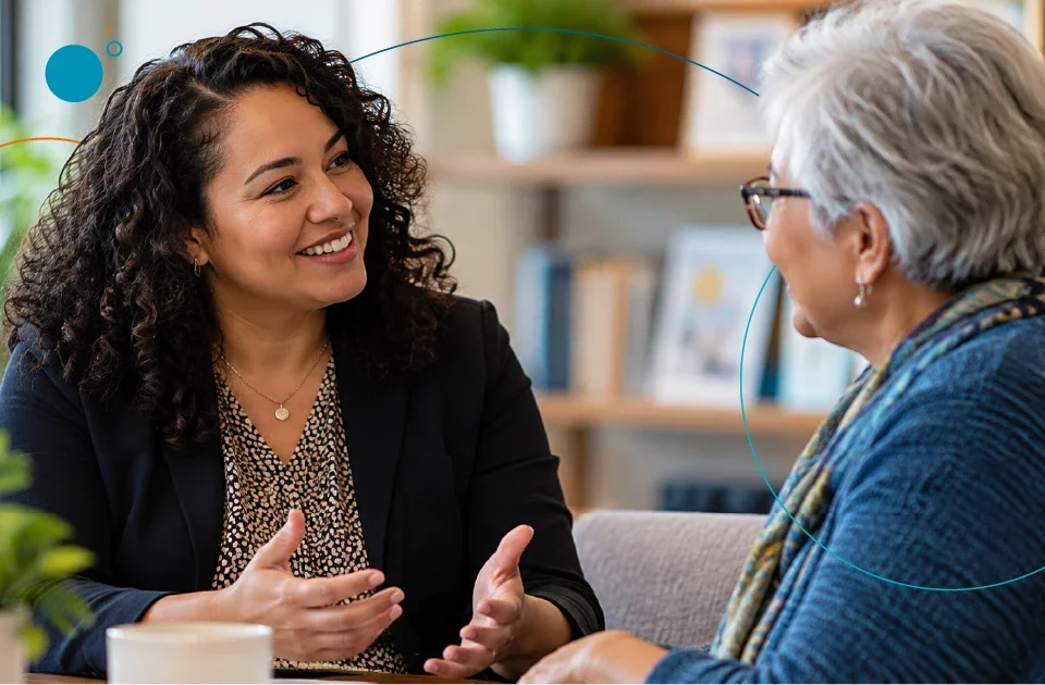 Photo of a nonprofit development professional having a personal comversation with a longtime supporter