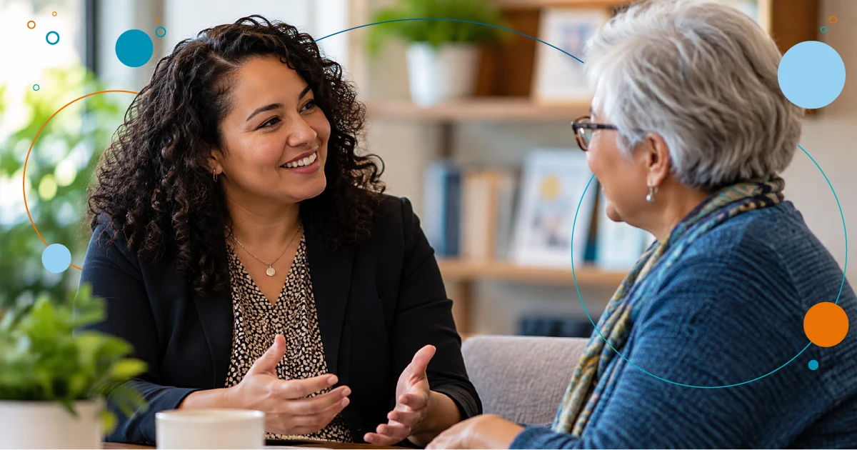 Photo of a nonprofit development professional having a personal comversation with a longtime supporter